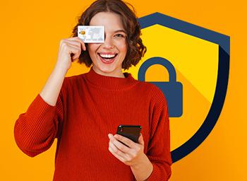 Female holding mobile phone and covering eye with piece of card